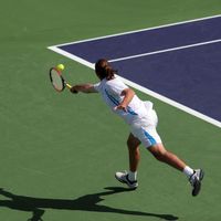 Playing tennis